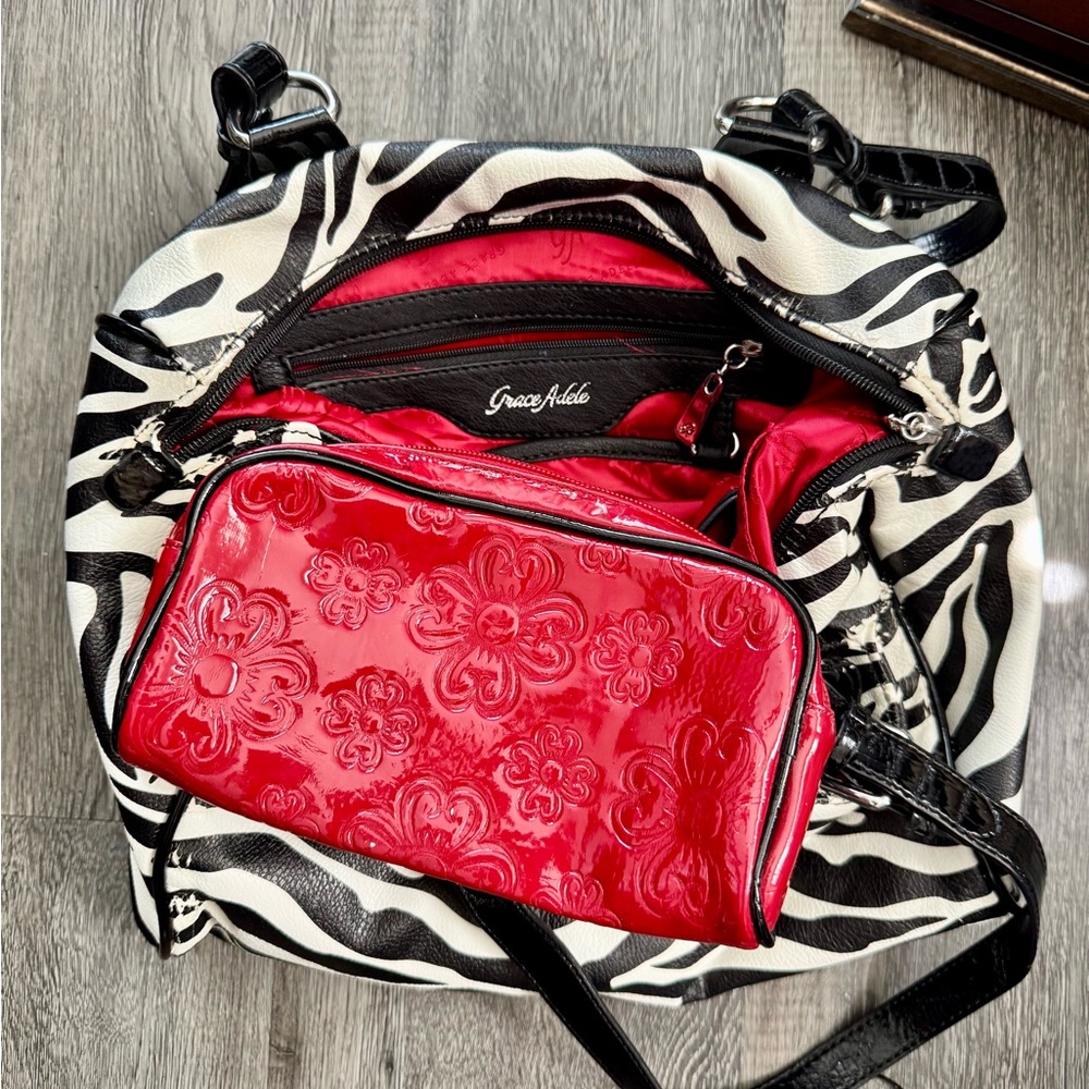 Grace Adele Black and White Zebra Shoulder Bag with Red Floral Accent